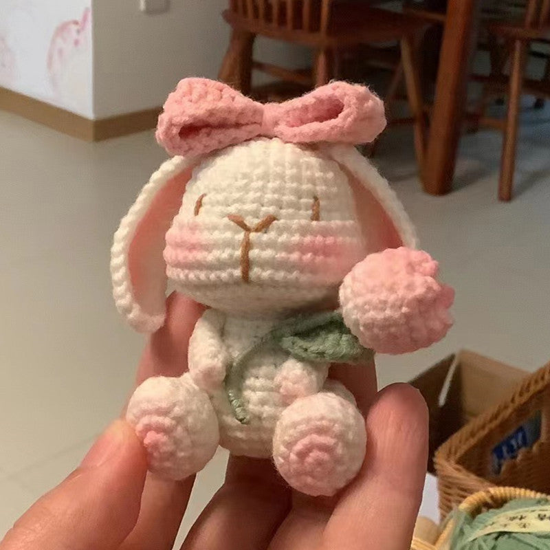 Finished crochet bunny keychain example made from the material kit
