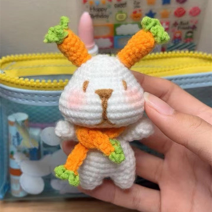 Finished crochet rabbit keychain example made from the material kit